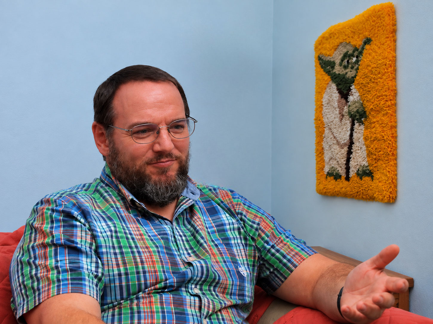 Jason Curtis, sitting in his comfy therapy chair