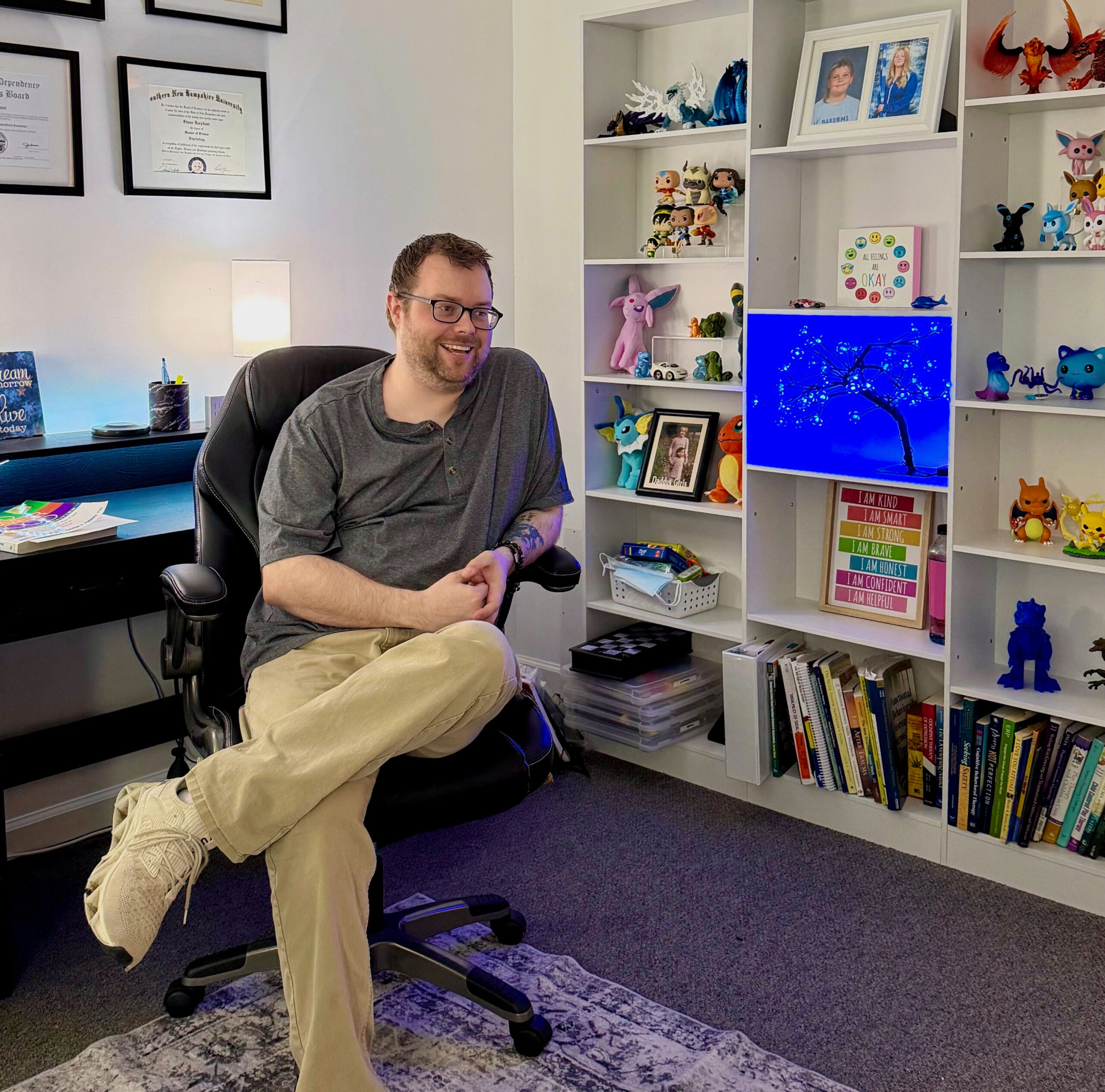 Shane Harphant sitting in his office chair